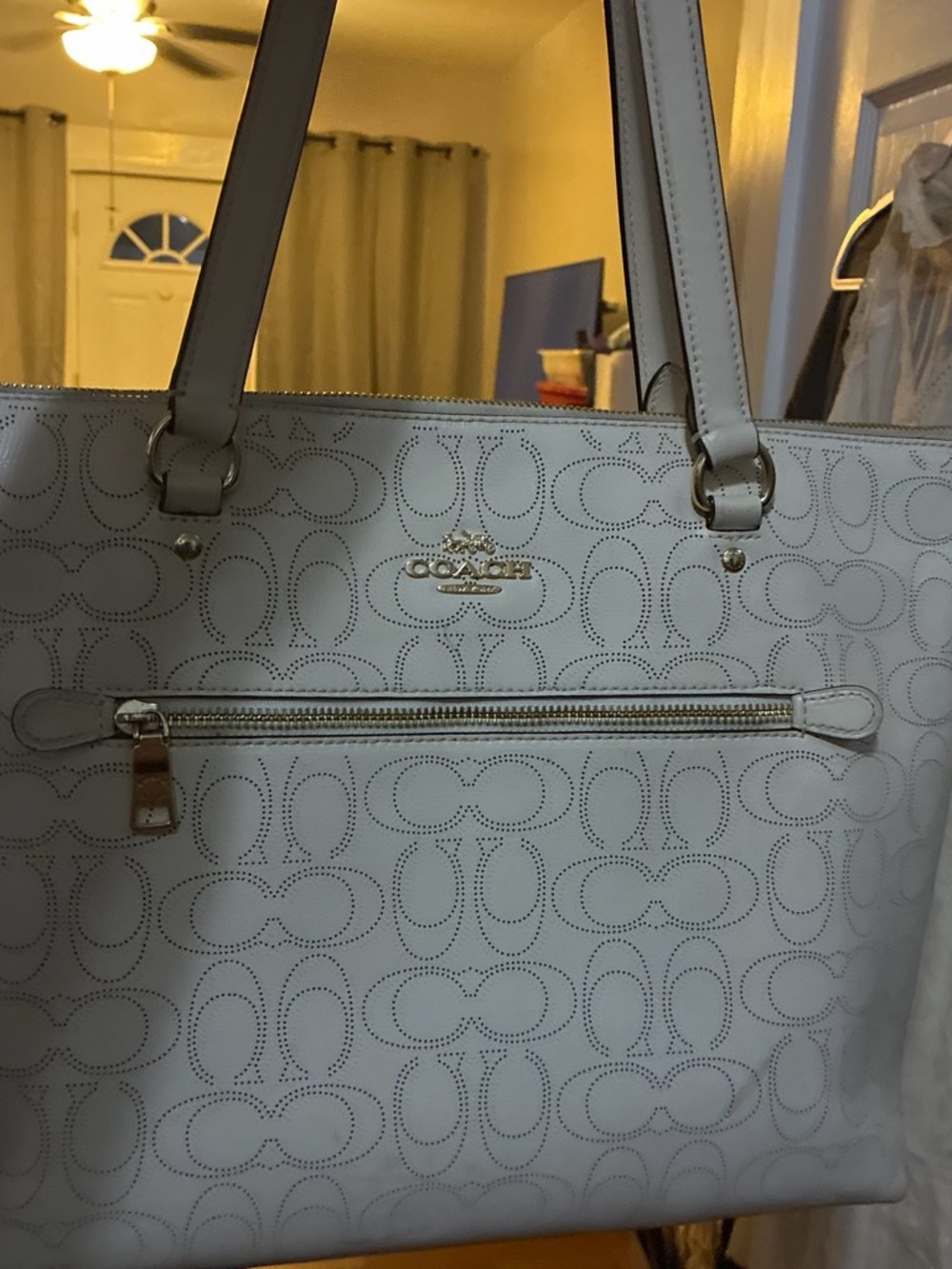 Coach authentic serial number is picture the Women's Perforated Cream Tote bag